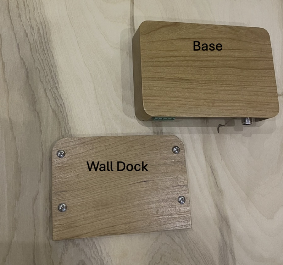 Regulator Base and the separate Wall Dock plate lying side by side